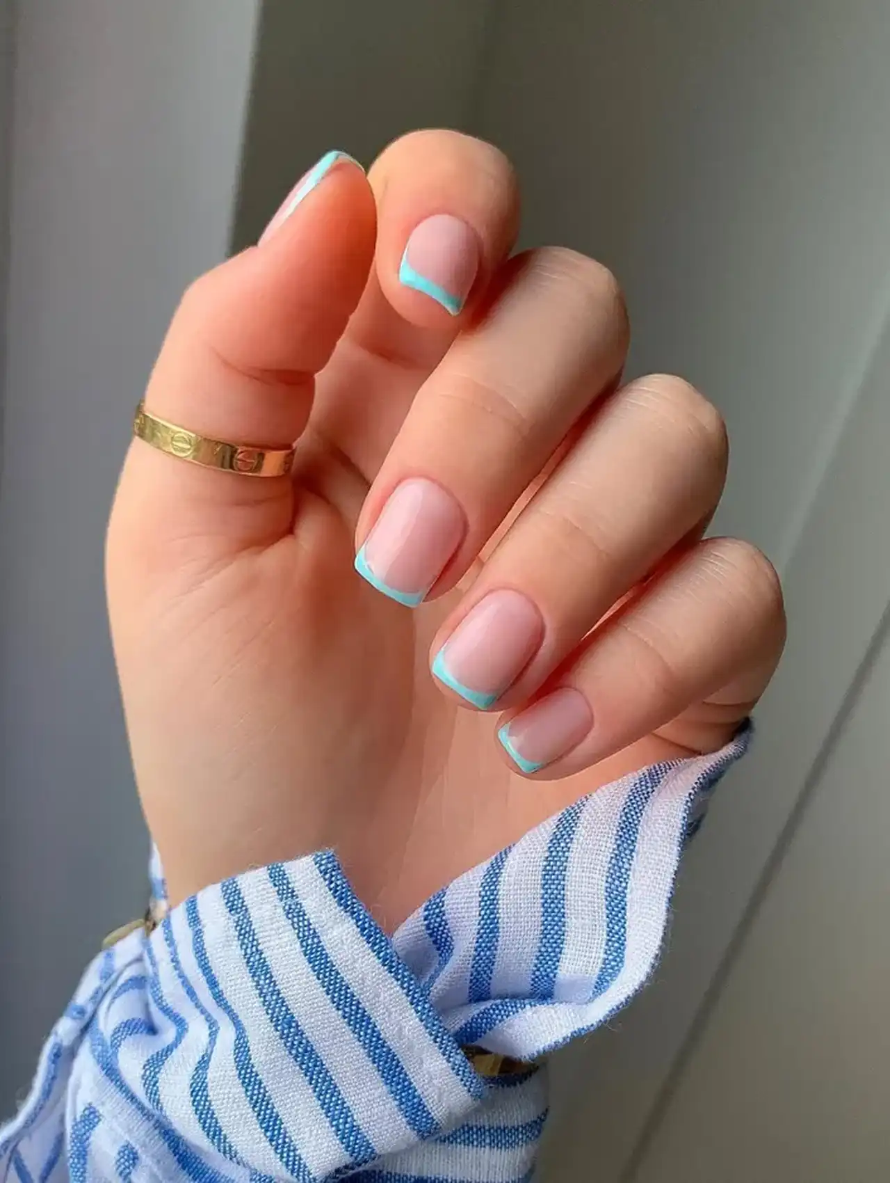 Minimal short French tips with turquoise lines – summer nail designs