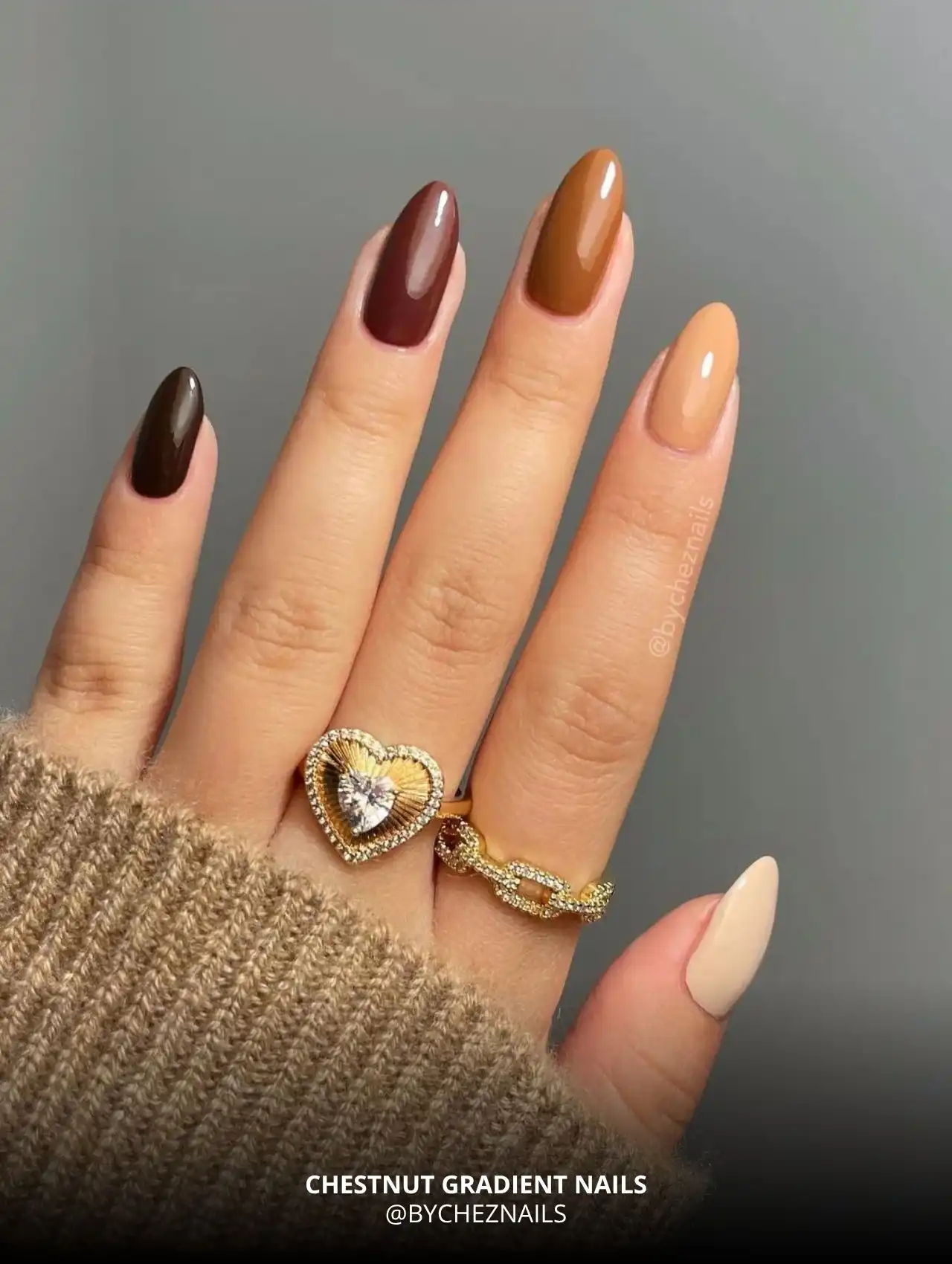 Chestnut gradient fall nail design in warm brown tones.