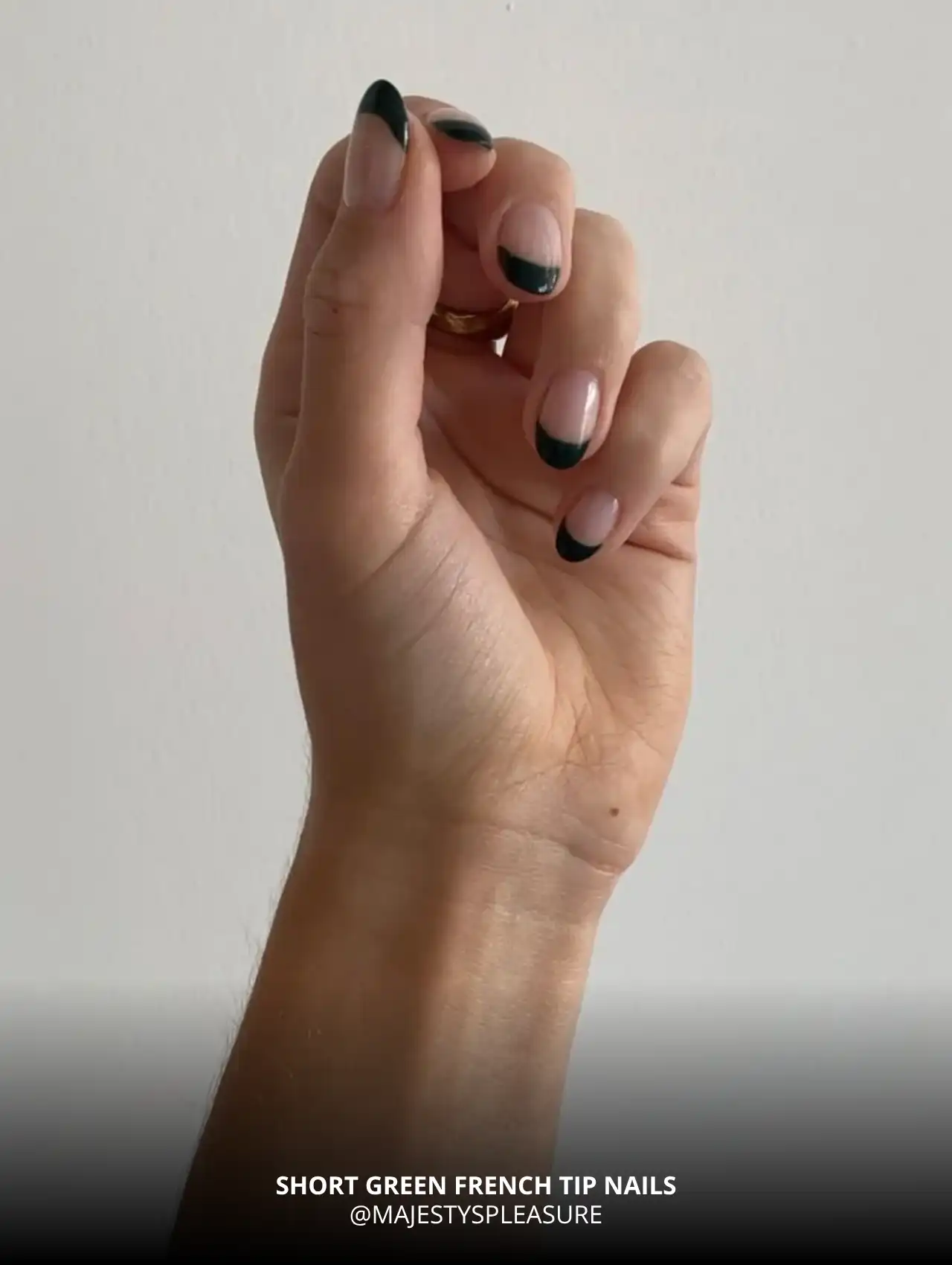 Short French manicure with green fall nail tips