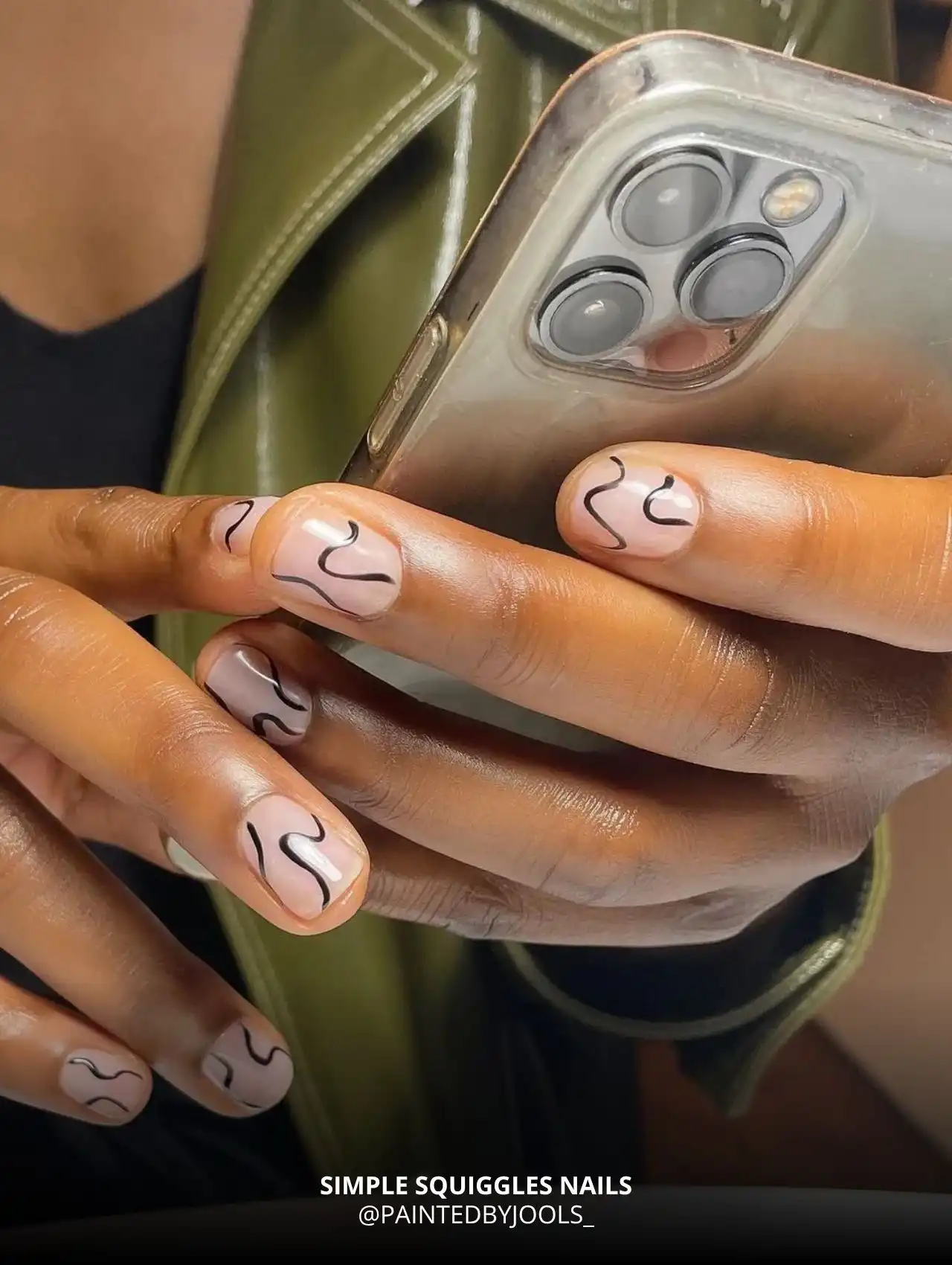 Simple Squiggles fall nail design with black lines on nude base