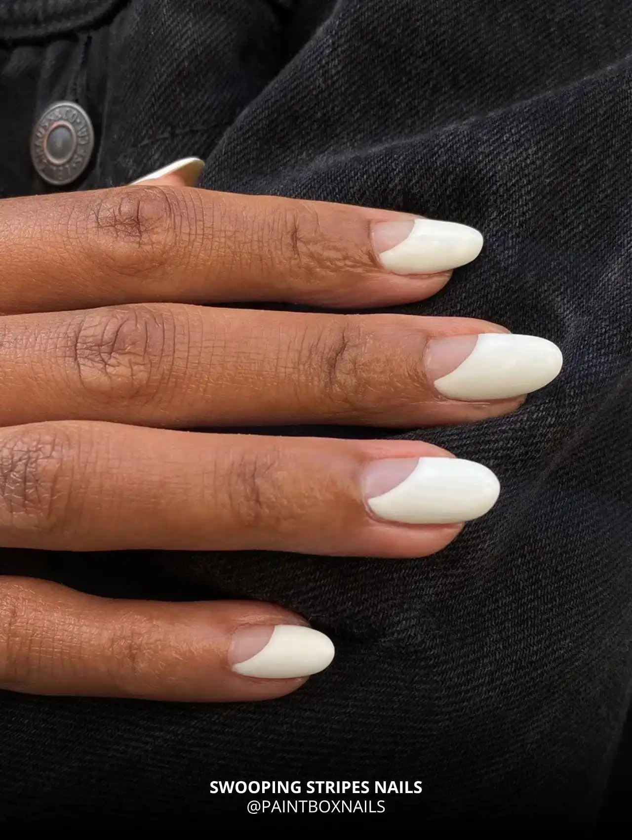 Swooping Stripes fall nail design in creamy white on almond-shaped nails