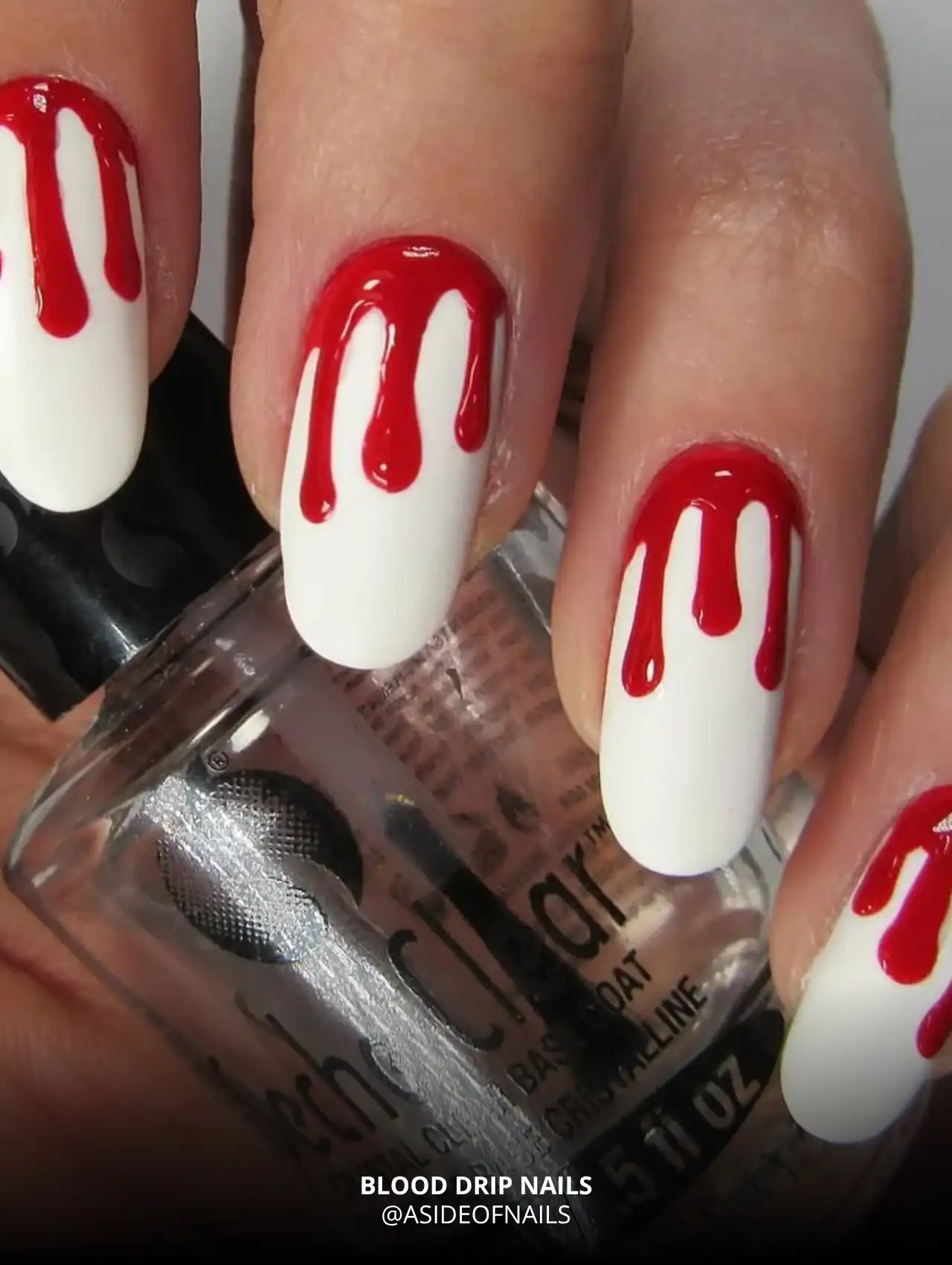 Bright white nails with red blood drip art, trendy Halloween nails