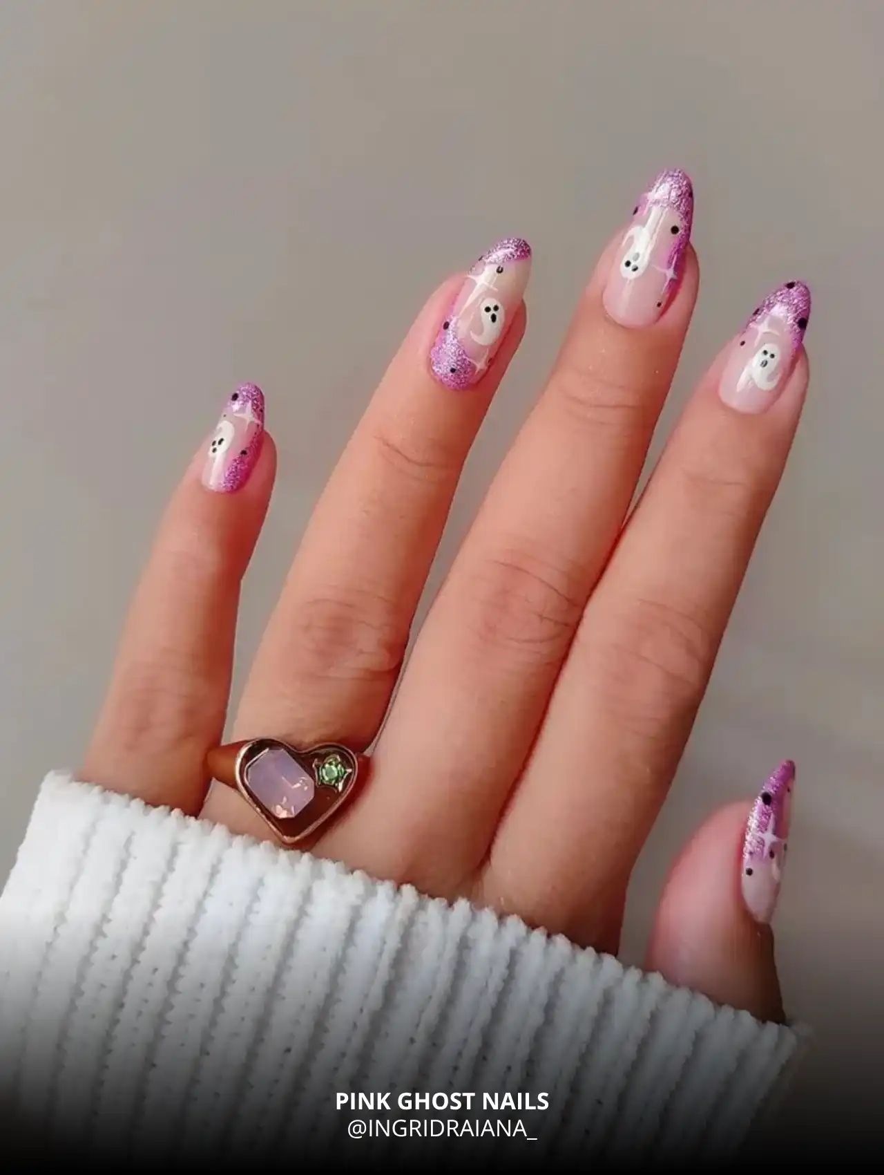 Pink glitter ghost nails with French tip design, trendy Halloween nails