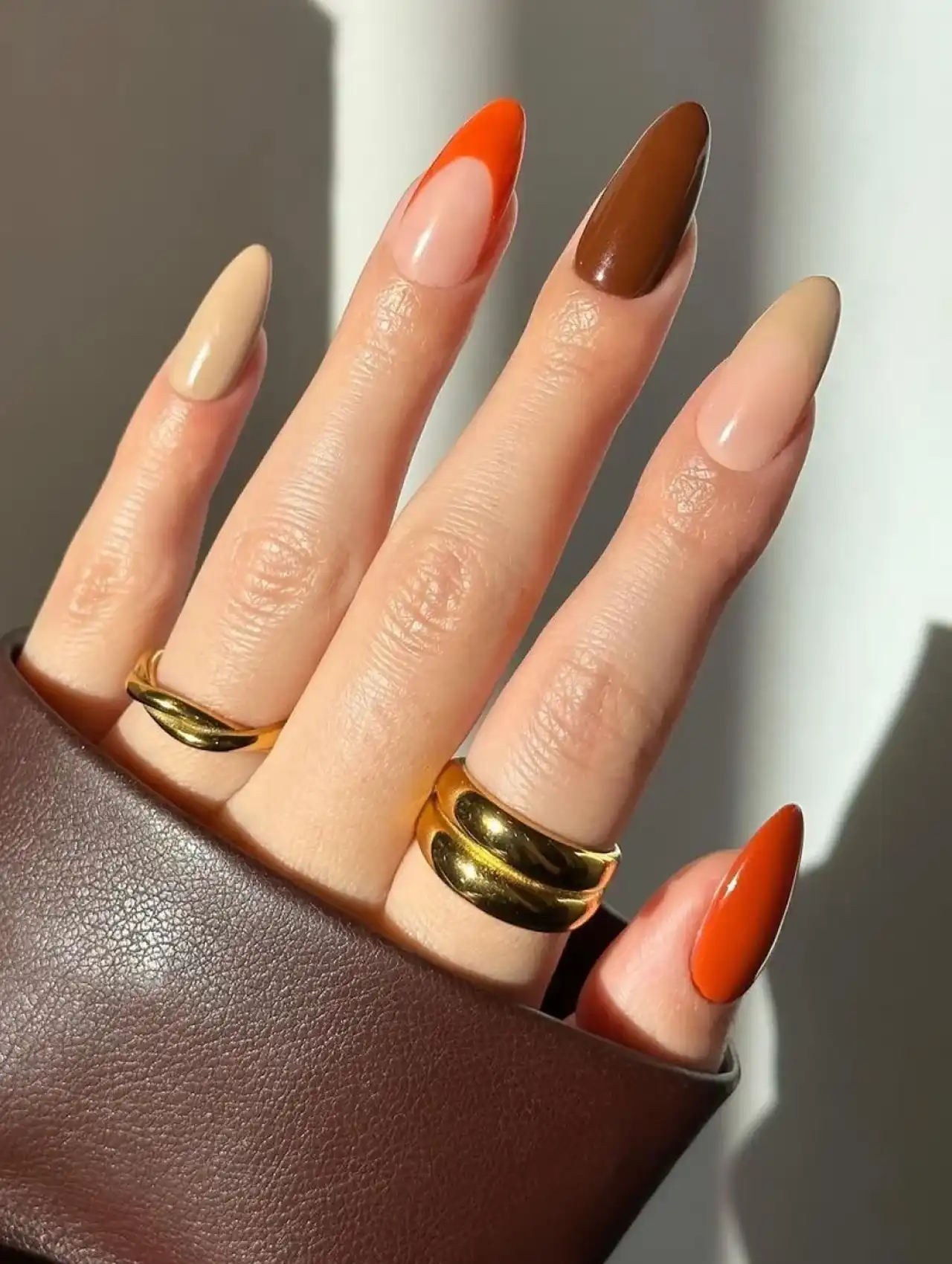 Classic French tip mismatched Thanksgiving nails with varying autumn colors