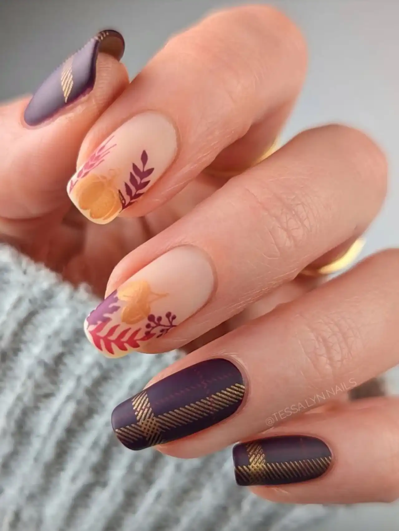 Cozy plaid Thanksgiving nails in warm brown and cream patterns