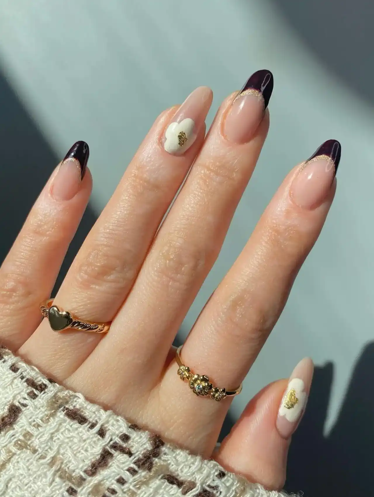 Thanksgiving nails with soft floral designs on pastel shades