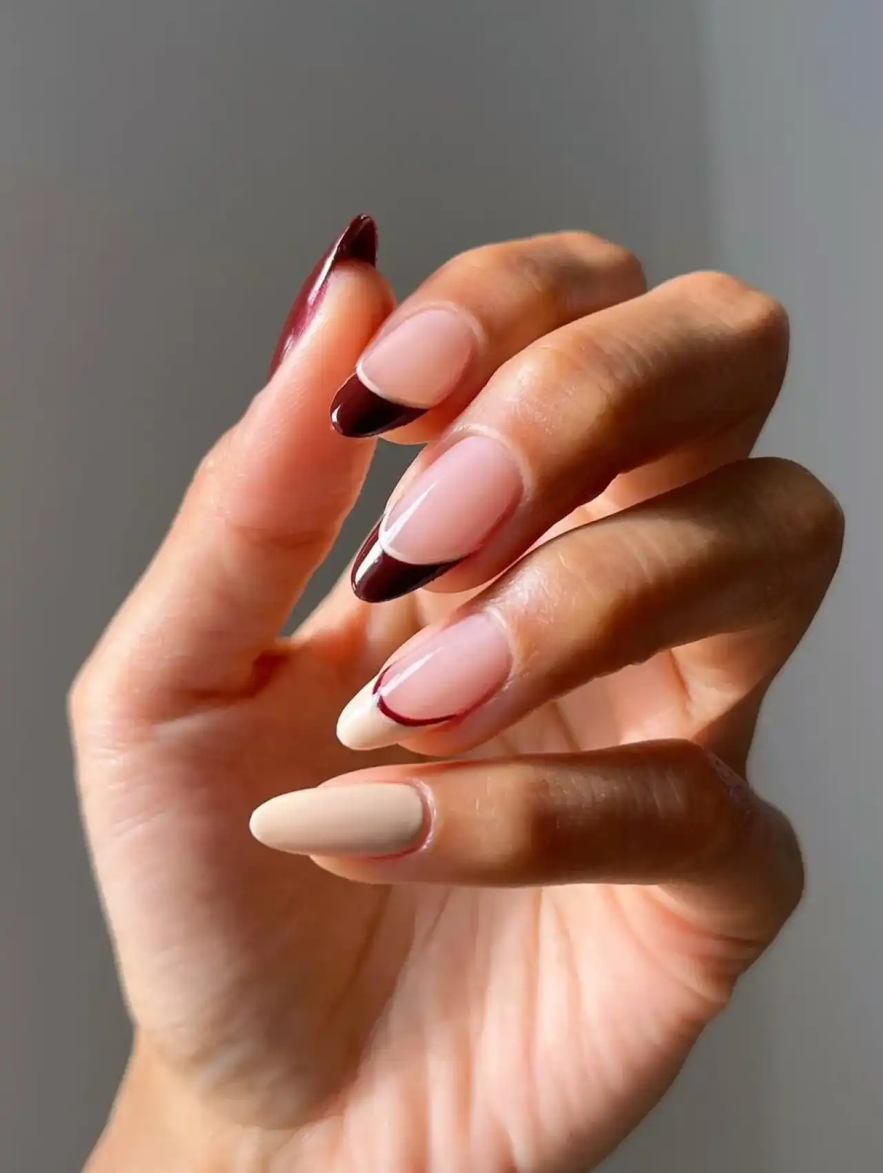 Thanksgiving nails with two-tone French tips in autumn shades