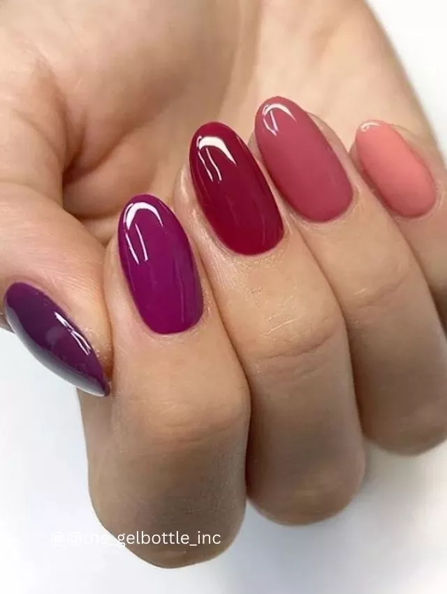 A sophisticated gradient manicure that transitions from deep plum to soft peach, creating a rich and elegant ombre effect. Each nail features a unique shade in the berry and pink spectrum, offering a stunning monochrome variation. The glossy finish enhances the depth of color, making it a perfect choice for a chic, polished look. Ideal for both fall and romantic occasions! 💜💖🍑