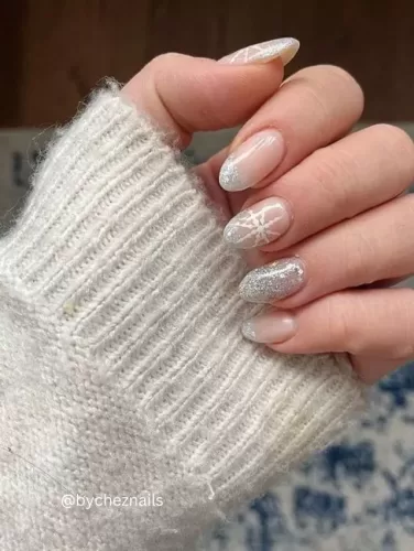 Glittery Snowflake Winter Nails with Frosted Elegance