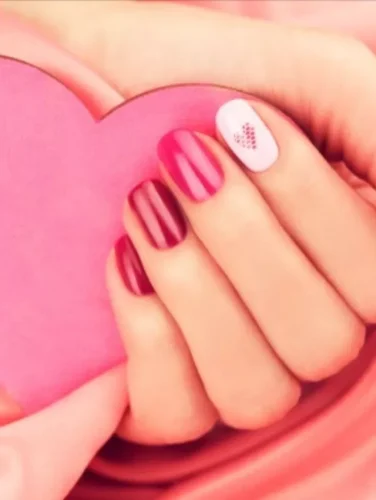 ¡Deja que tus uñas interpreten una sinfonía romántica este Día de San Valentín con este elegante diseño ombré! Con tonos rosados profundos que transicionan a rosas suaves, estas uñas irradian gracia y encanto. La uña de acento se roba el espectáculo con un delicado diseño de corazón sobre una base blanca nítida, añadiendo un toque dulce y femenino. Perfecto para una noche romántica o una celebración de amor propio, ¡este look es sencillo pero impactante!