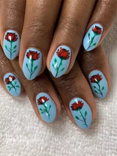 Las clásicas rosas rojas se encuentran con una base azul cielo soñadora en este diseño de uñas romántico y elegante. Las delicadas flores pintadas a mano evocan vibras de cartas de amor vintage, lo que lo convierte en la elección perfecta para el Día de San Valentín o cualquier ocasión que requiera un toque de romance. Suave pero audaz, ¡este diseño captura la belleza del amor en su máximo esplendor!