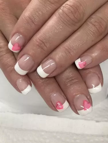 Subtle French Tips with Pink Hearts