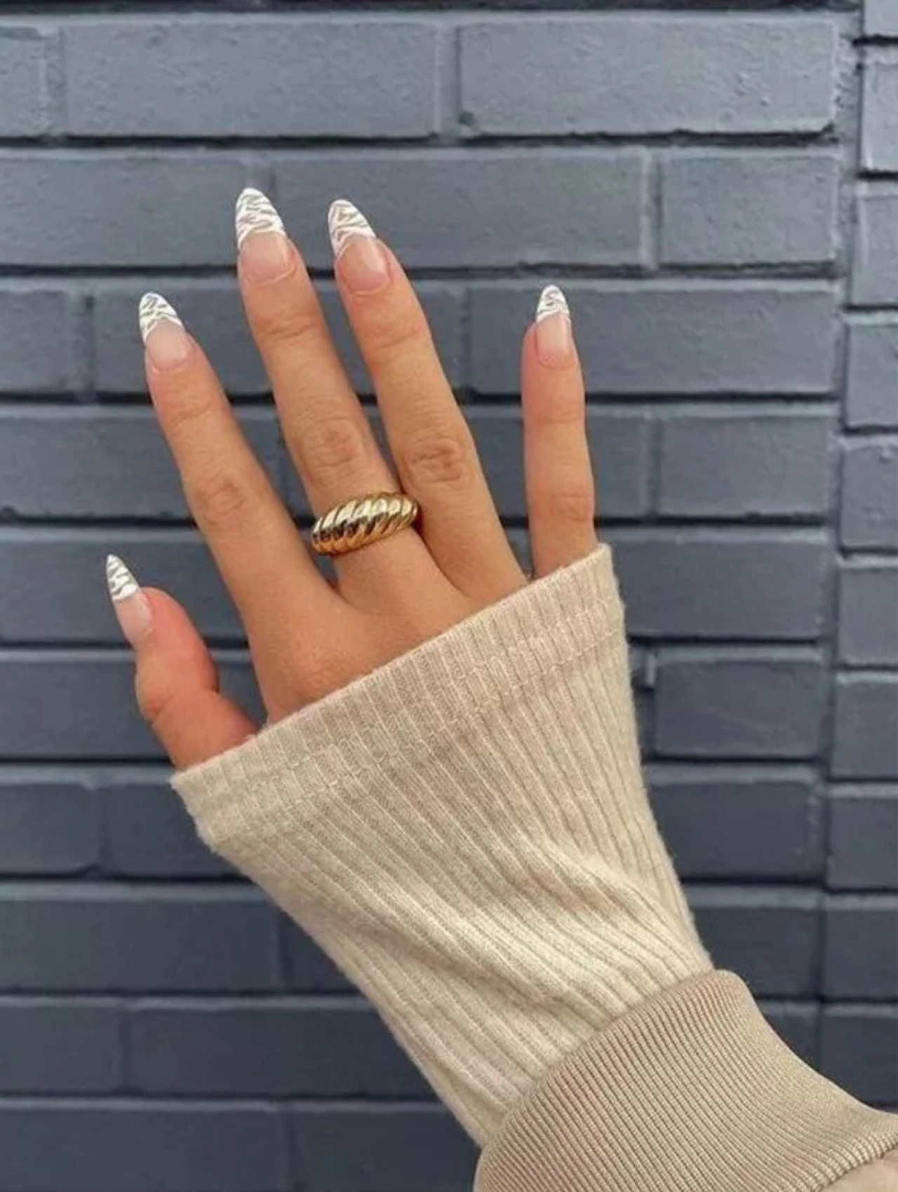 Minimalist marble-tipped French manicure perfect for elegant December Nails