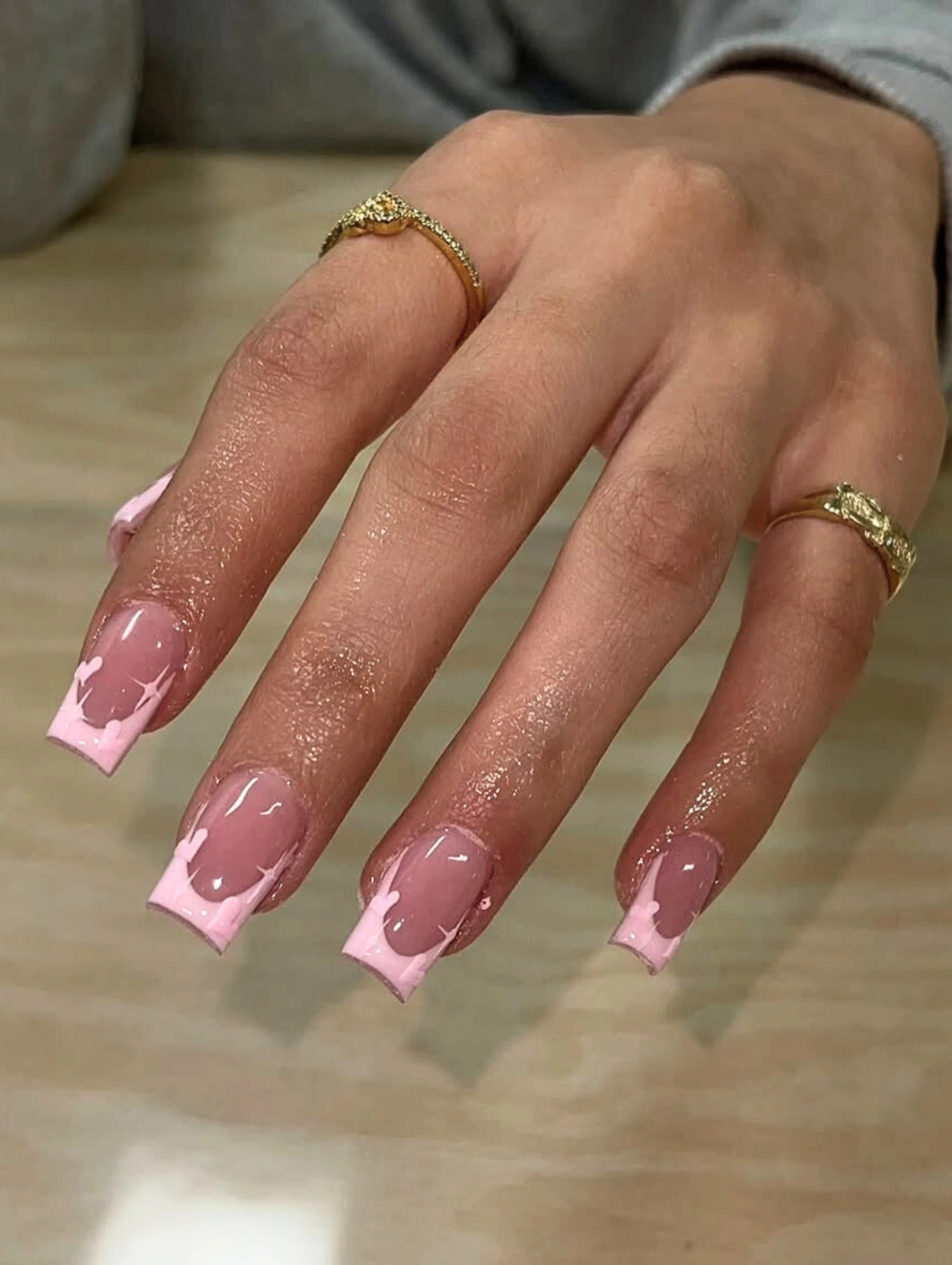 Pink Heart French Tip Valentine’s Nails Coffin with glossy nude bases and soft pink heart-accented French tips.