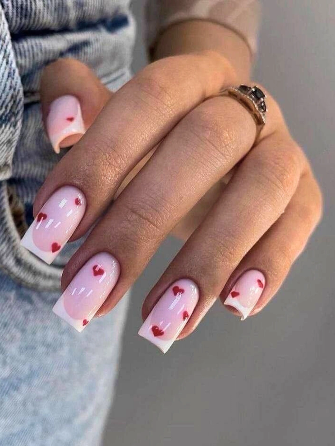 Pink French Coffin Valentine’s Nails with glossy nude bases and shimmering white tips!