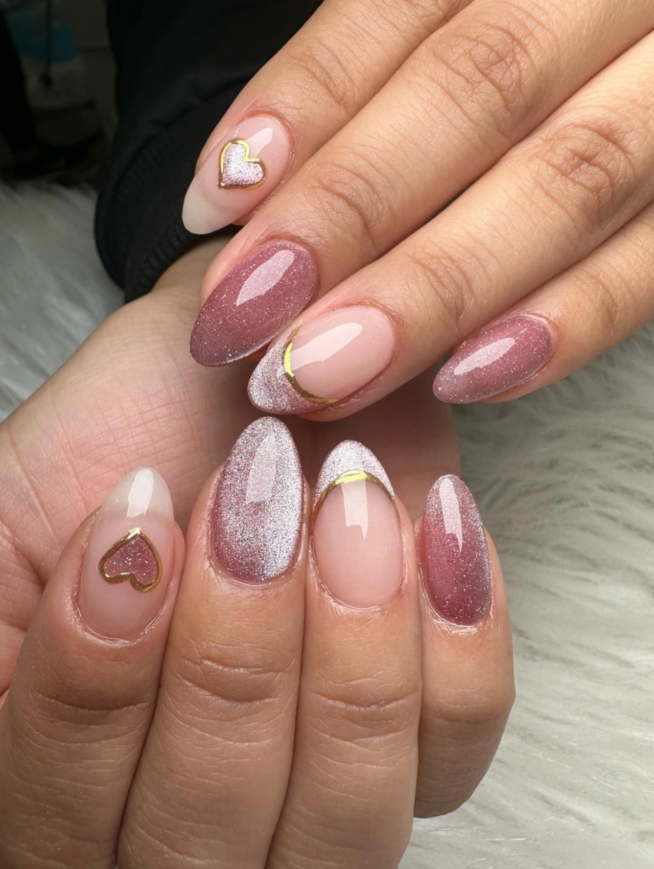 Rose Gold Heart Accent Valentine’s Nails Dip Powder with glitter finishes and heart details.