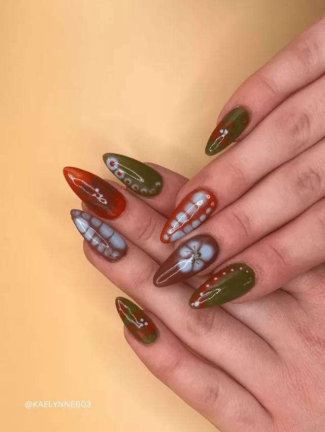  Almond-shaped nails with earthy green, terracotta, and floral blooming gel Nails.