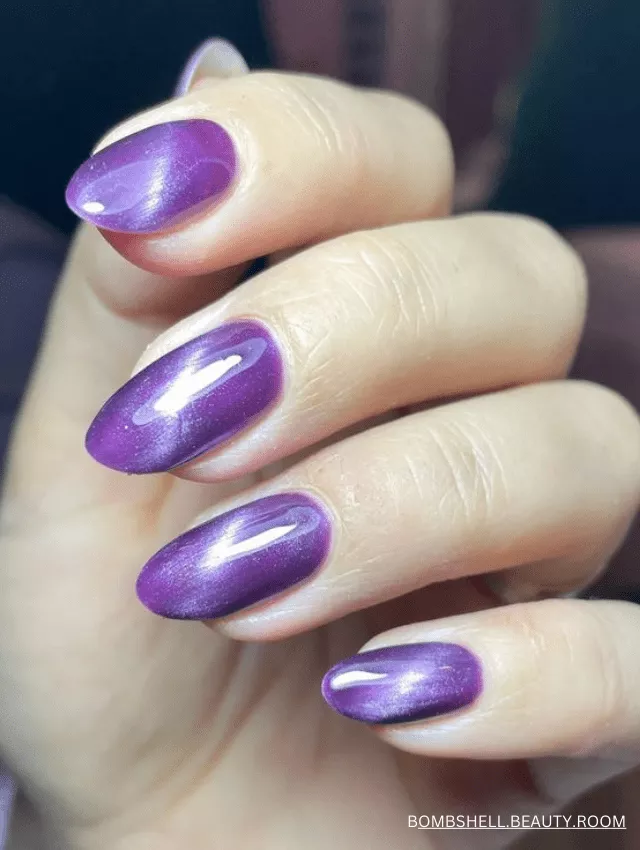 Shimmery amethyst velvet nails with a soft, ethereal glow.