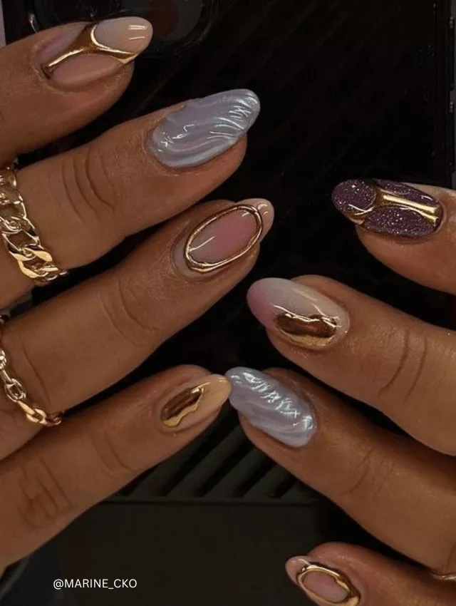 Multi-textured chrome nails in pastel and gold with abstract details.