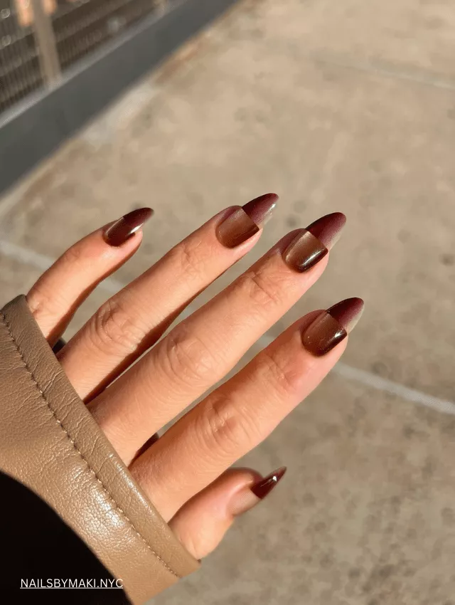 Warm brown velvet nails with a soft gradient French tip design