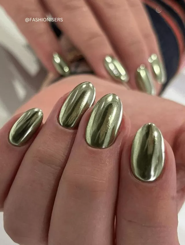 Oval-shaped nails with reflective green chrome polish.