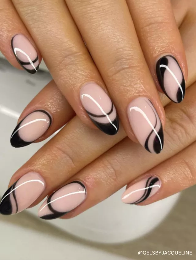 A modern black abstract French tip nail design with sleek curved lines on a nude base.