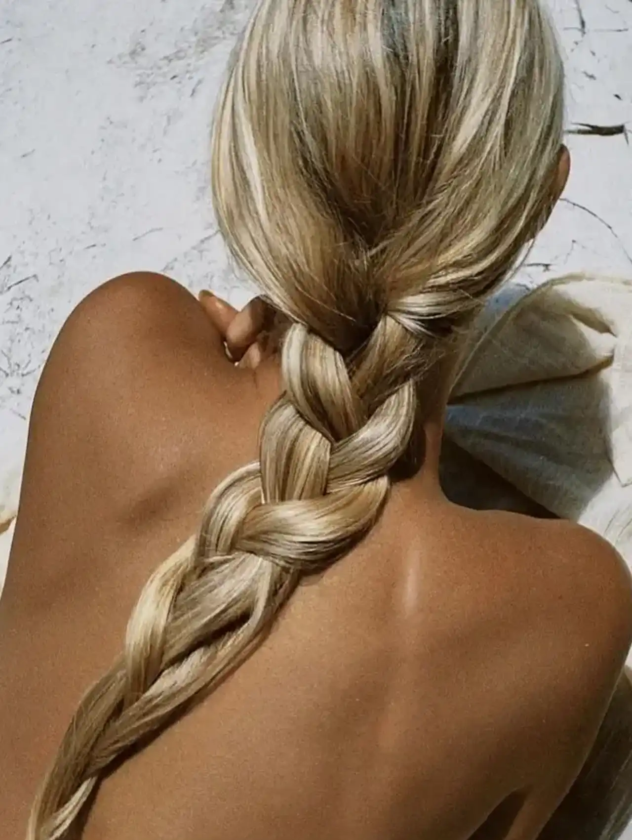 Sun-kissed beach braid ponytail - easy hairstyles for summer days