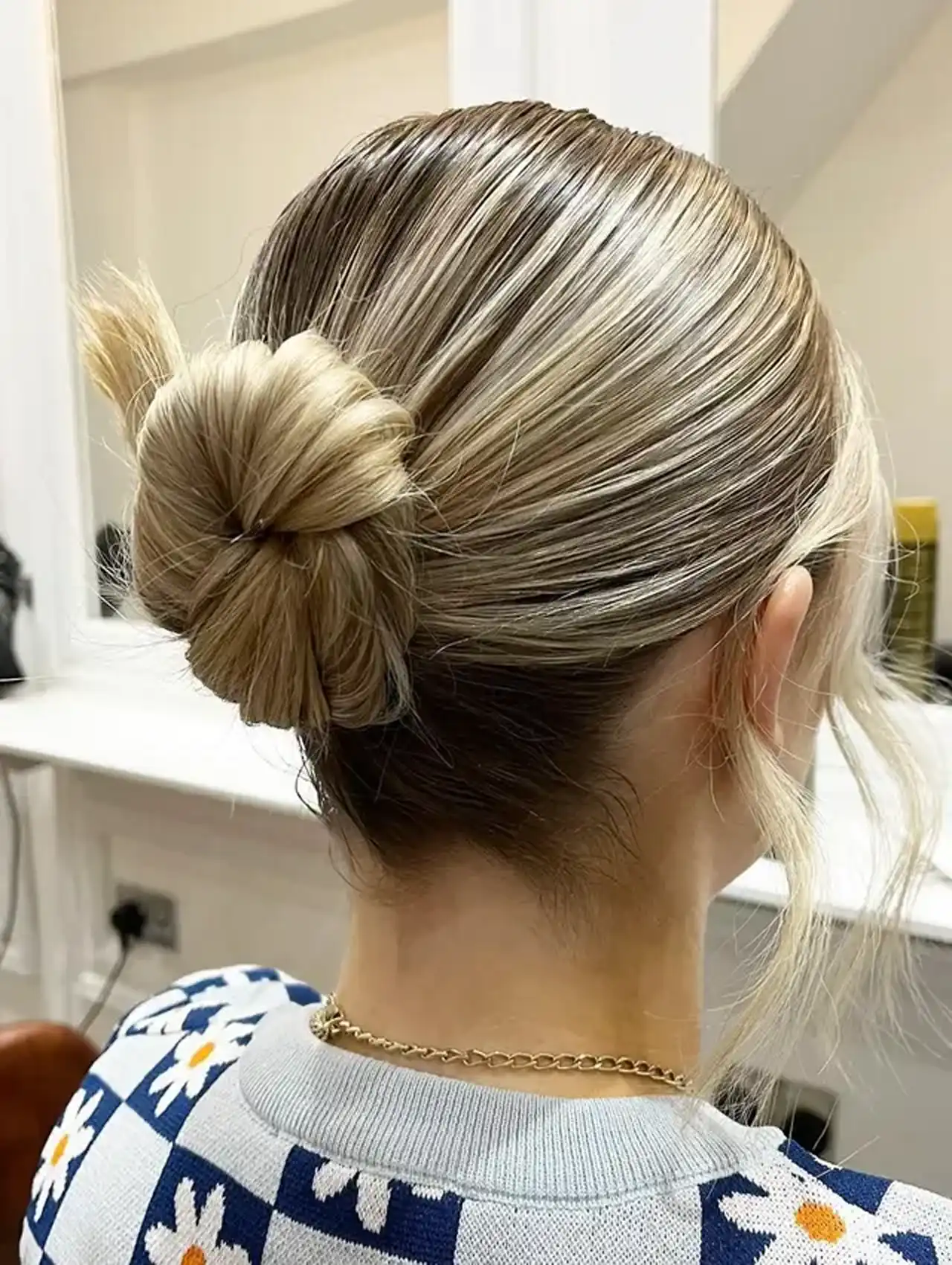 Elegant low bun - easy hairstyles for professional and formal looks