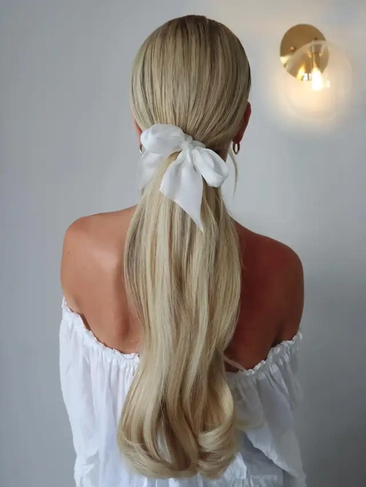 Ribbon ponytail - easy hairstyles with feminine detail