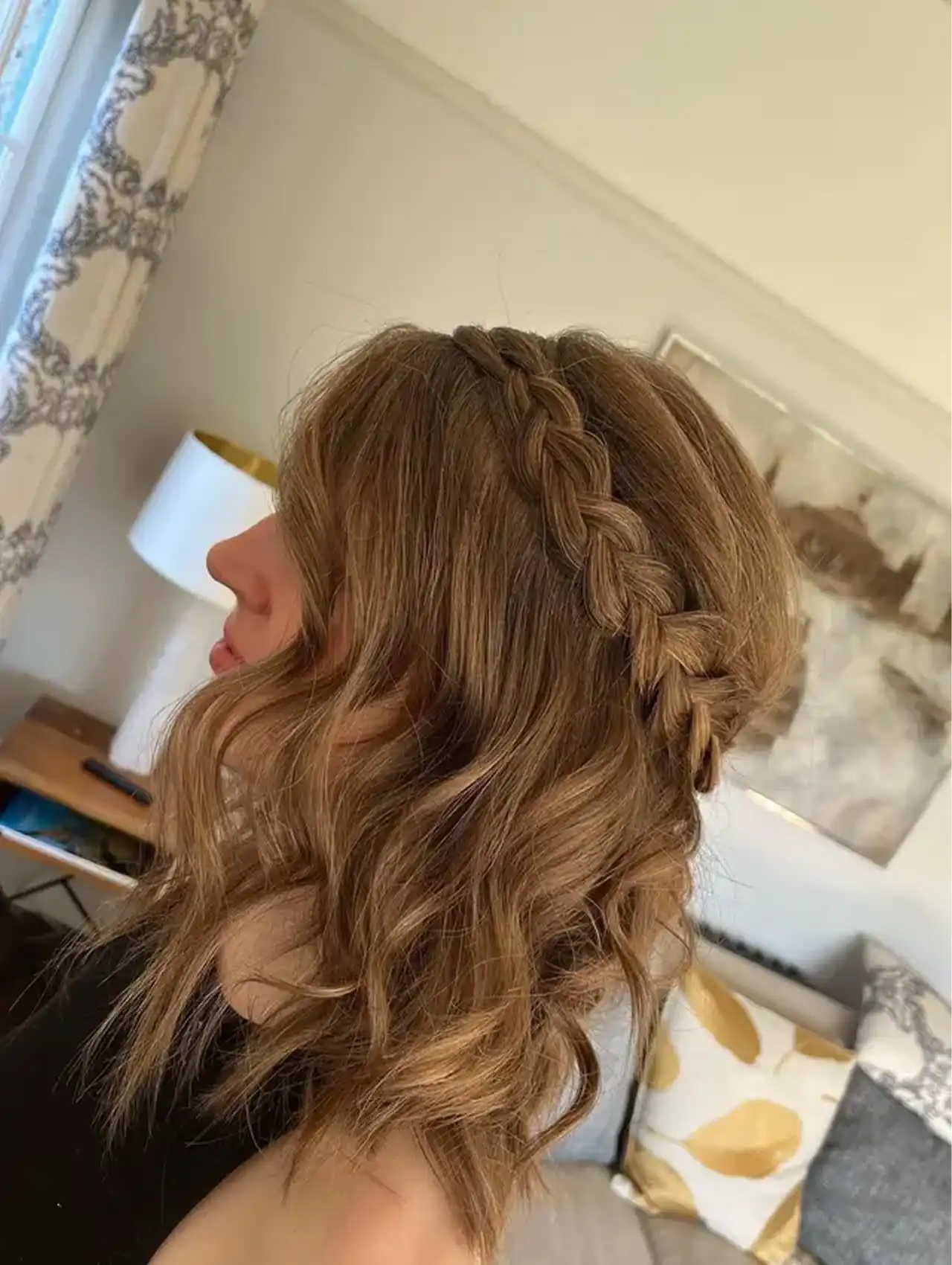 This bohemian-inspired crown braid frames the face beautifully, making it one of the best easy hairstyles for festivals, weddings, or outdoor gatherings.
