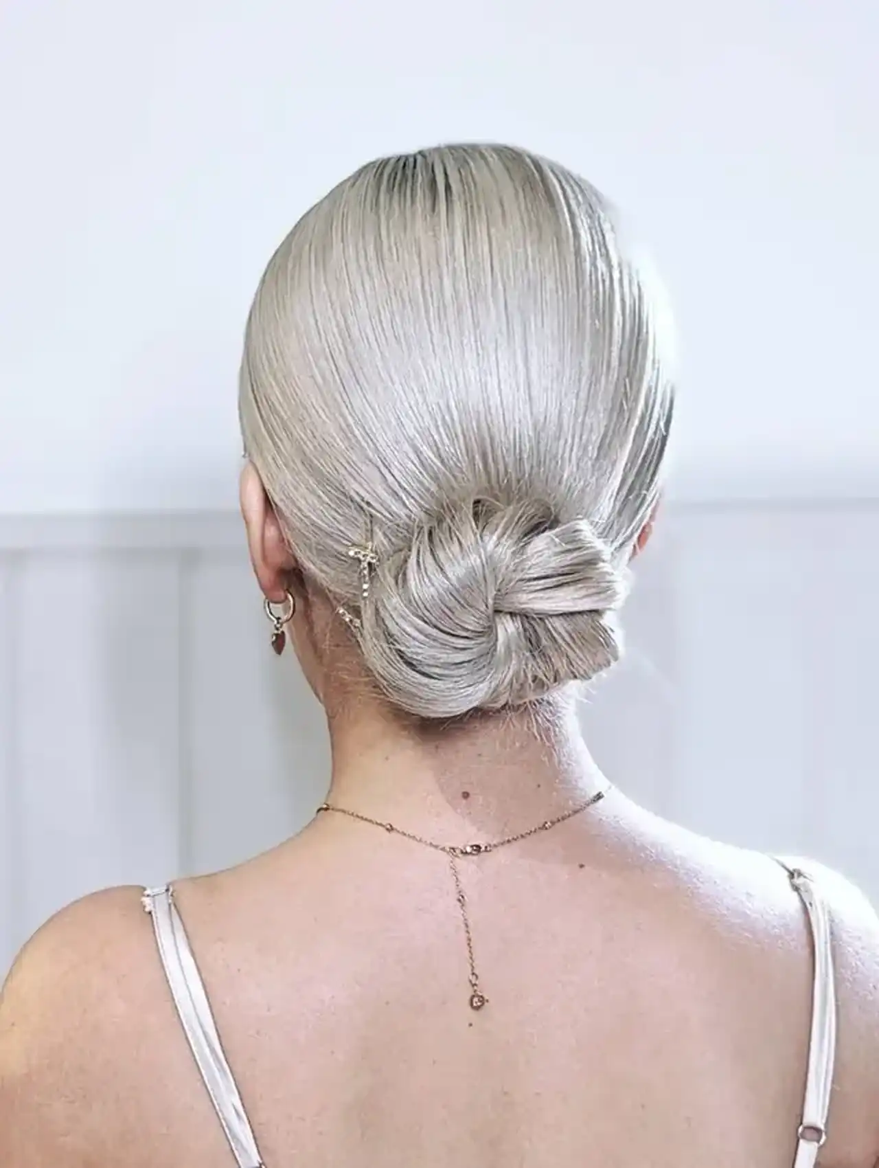 Slicked-back low bun - easy hairstyles for formal occasions