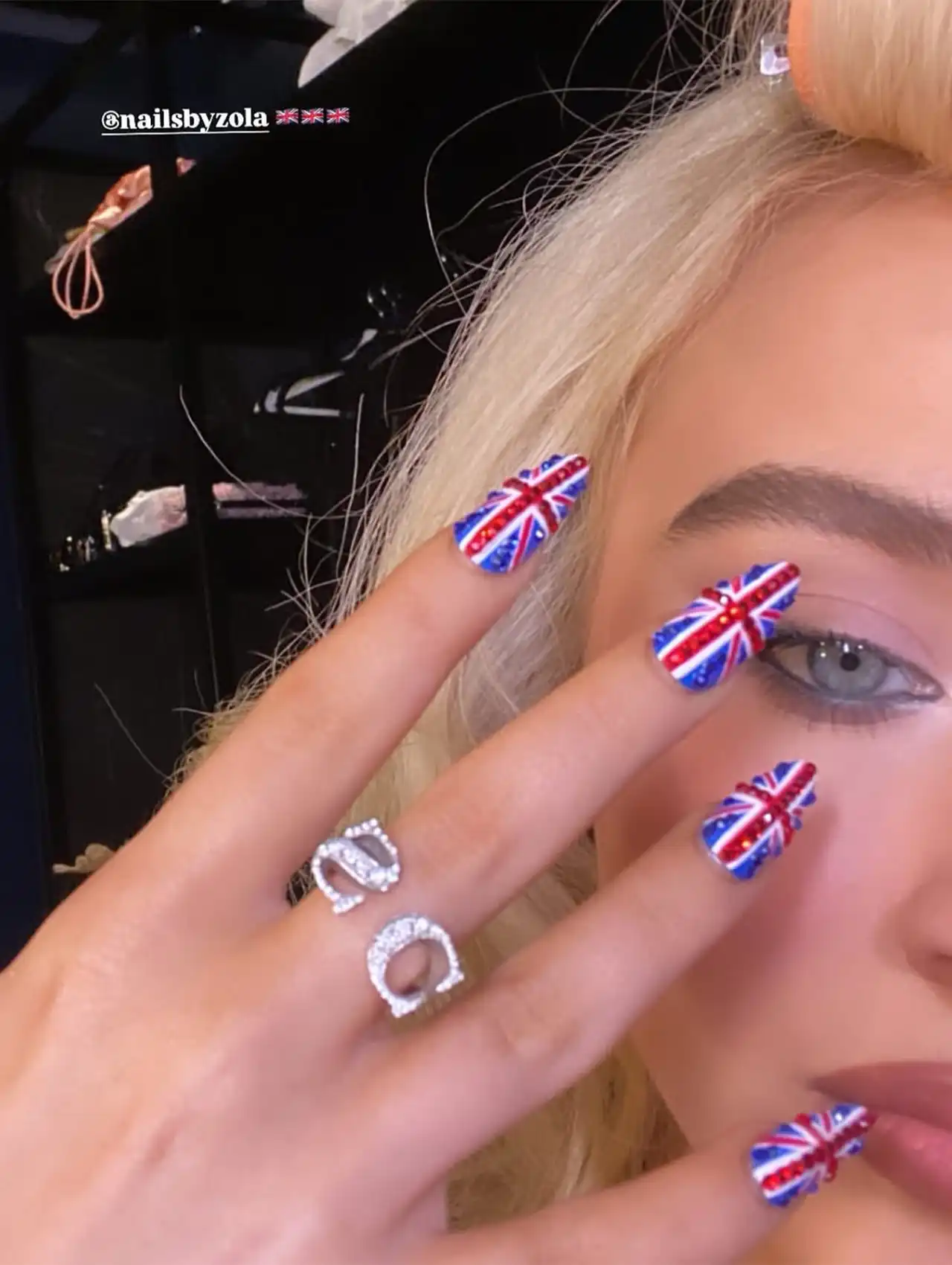 Sabrina Carpenter nails with Union Jack design in red, blue, and white