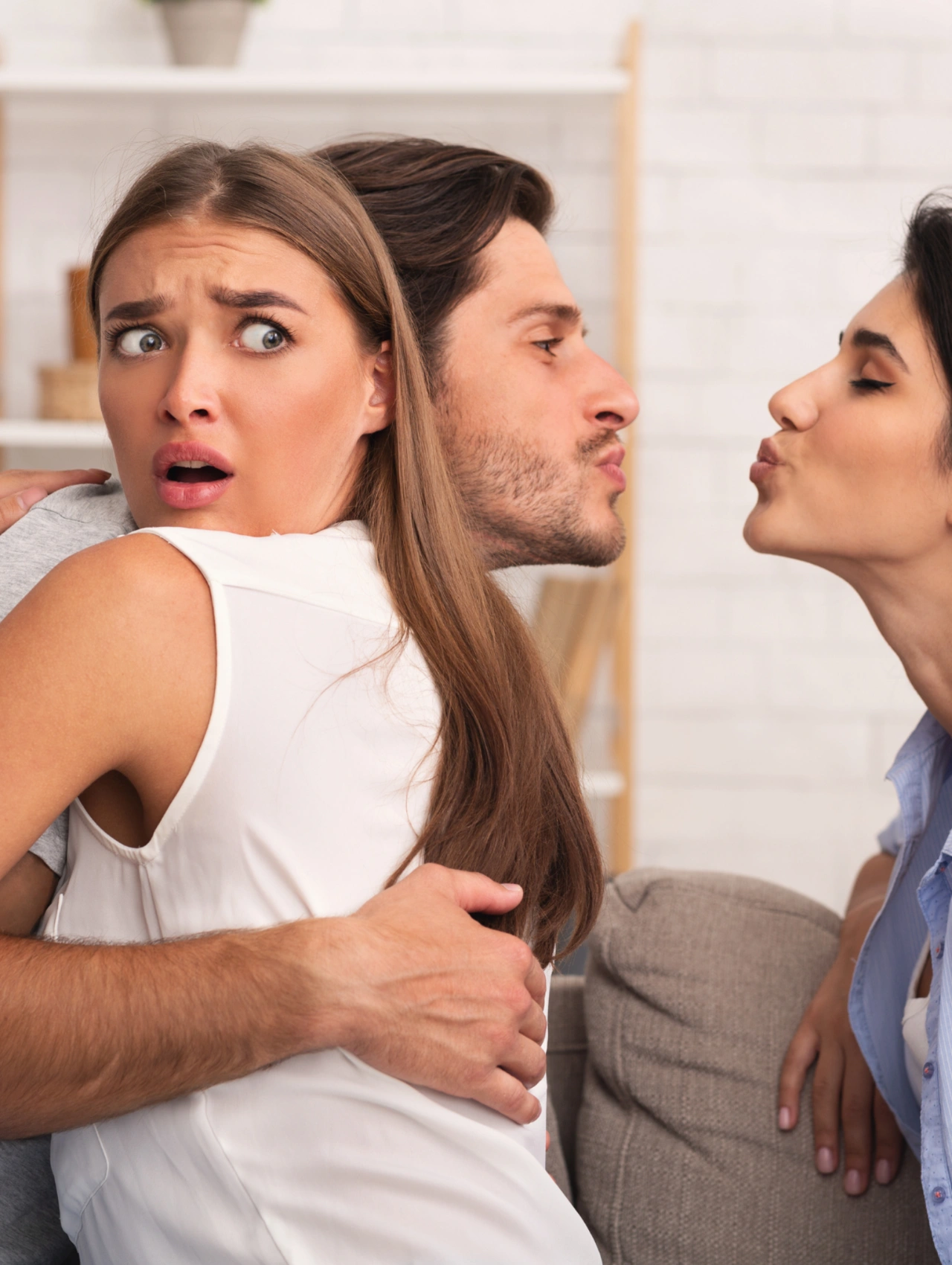 The Threesome Proposal Valentine’s Day Date, shocked woman reacting as a couple leans in during an uncomfortable Valentine’s Day Date moment