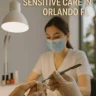 Nail technician performing manicure in Orlando nail salon with safety gloves and soft lighting