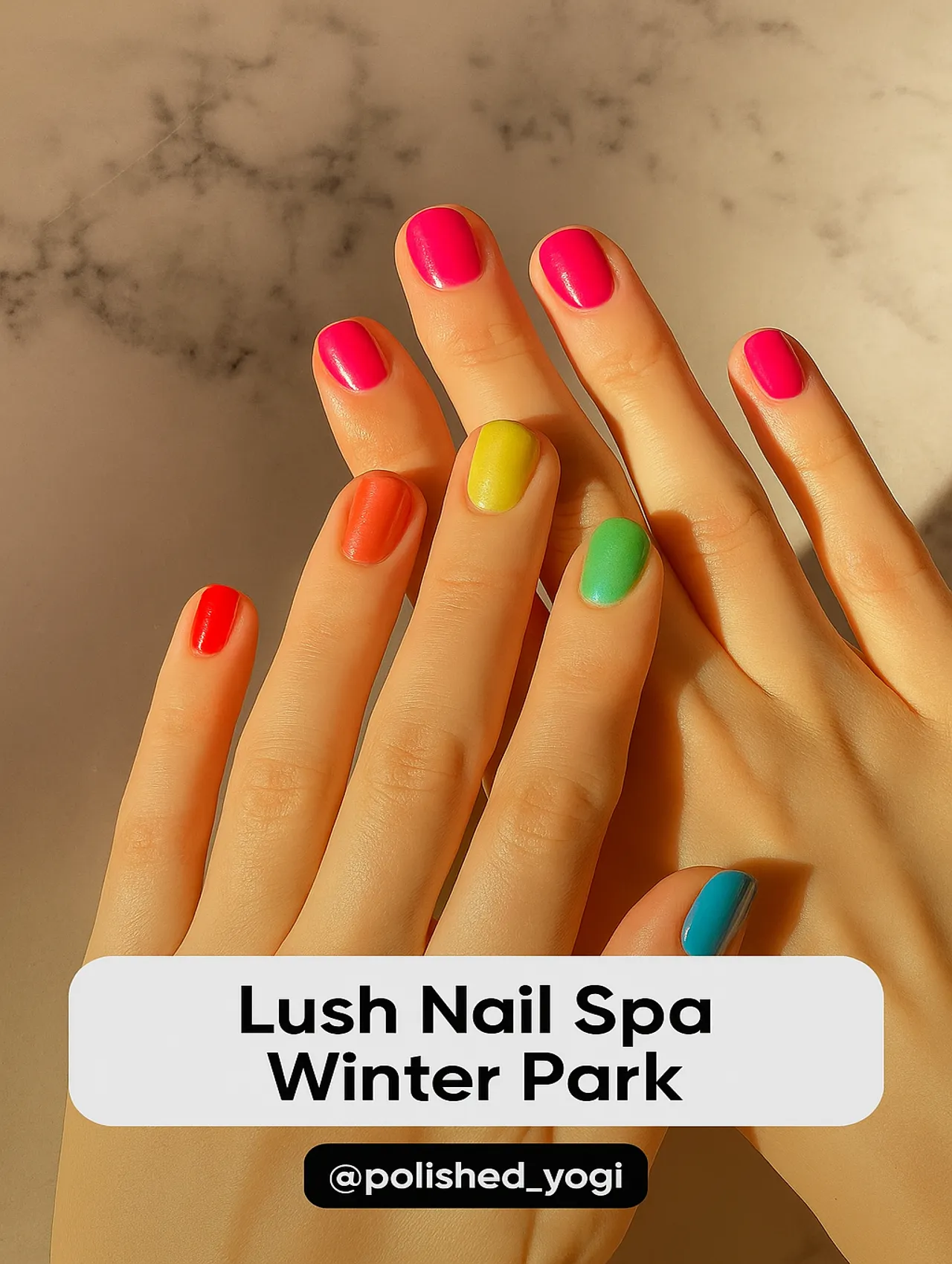 Close-up of hands with short nails painted in vibrant rainbow colors from Lush Nail Spa in Winter Park.