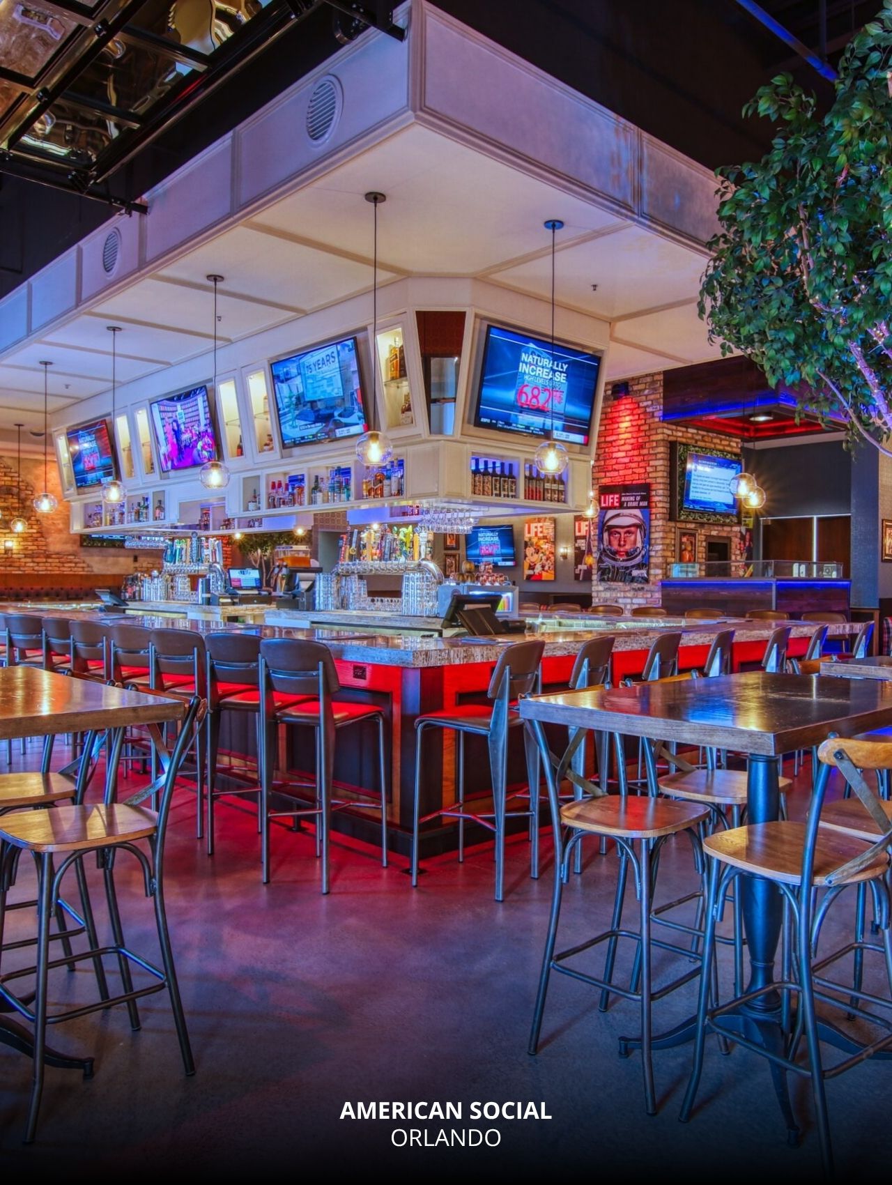 Modern upscale bar and TV-lined walls at American Social, Orlando Sports Bars