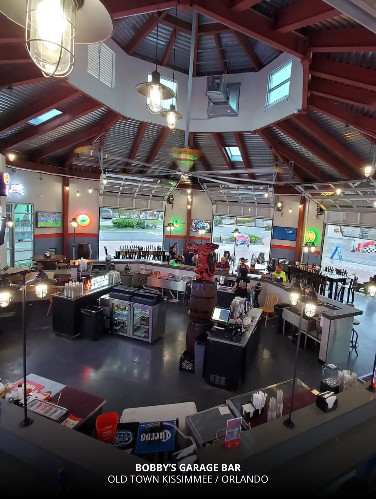 Open-air bar setup at Bobby’s Garage Bar in Old Town Kissimmee, a casual pick for sports bars in Orlando.