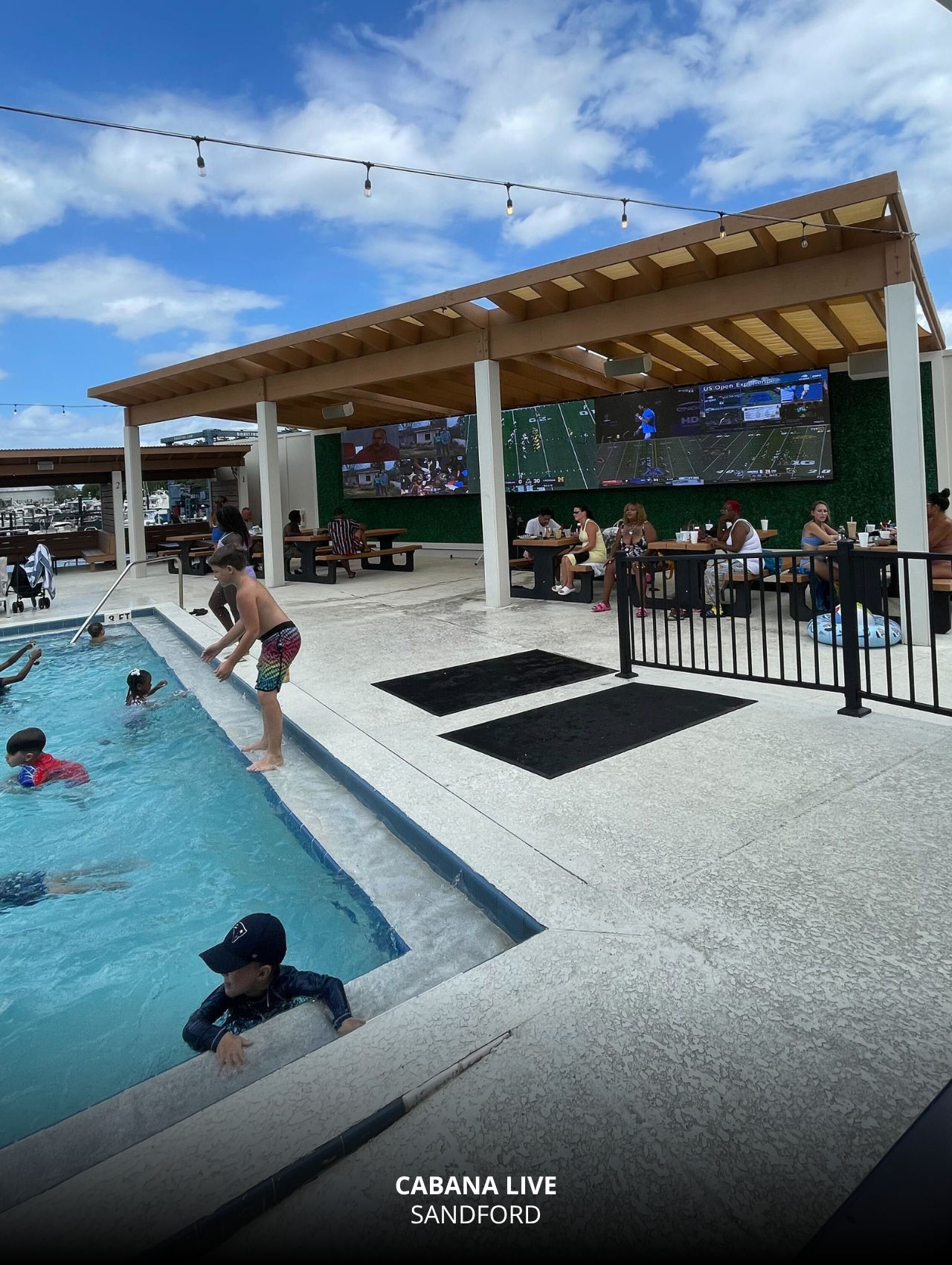 Poolside TVs and cabanas at Cabana Live in Sanford, Orlando Sports Bars