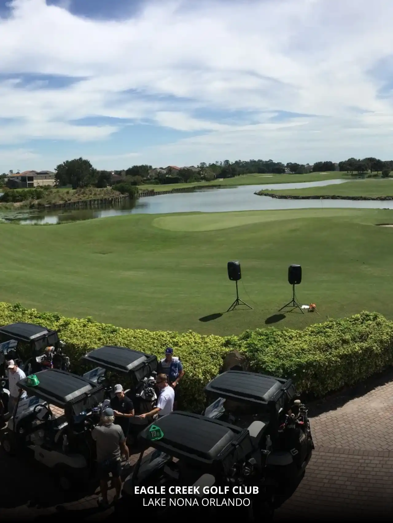 Golf carts and players gather at Eagle Creek Golf Club in Lake Nona, a scenic Orlando golf course with lakeside views