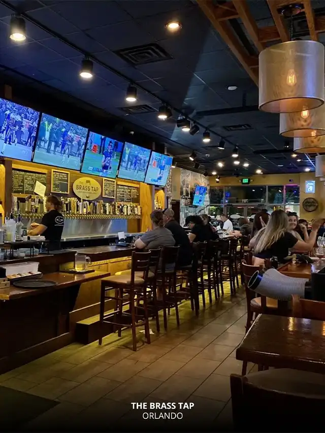 Guests enjoying beer and sports at The Brass Tap in Orlando – Orlando UCF Bars