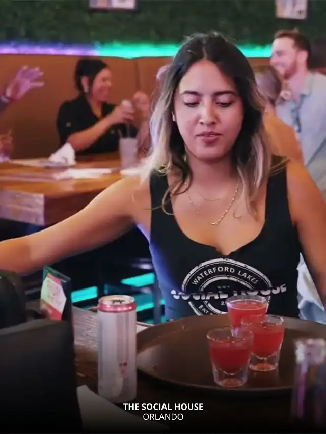 Bartender serving shots at The Social House in Orlando – Orlando UCF Bars