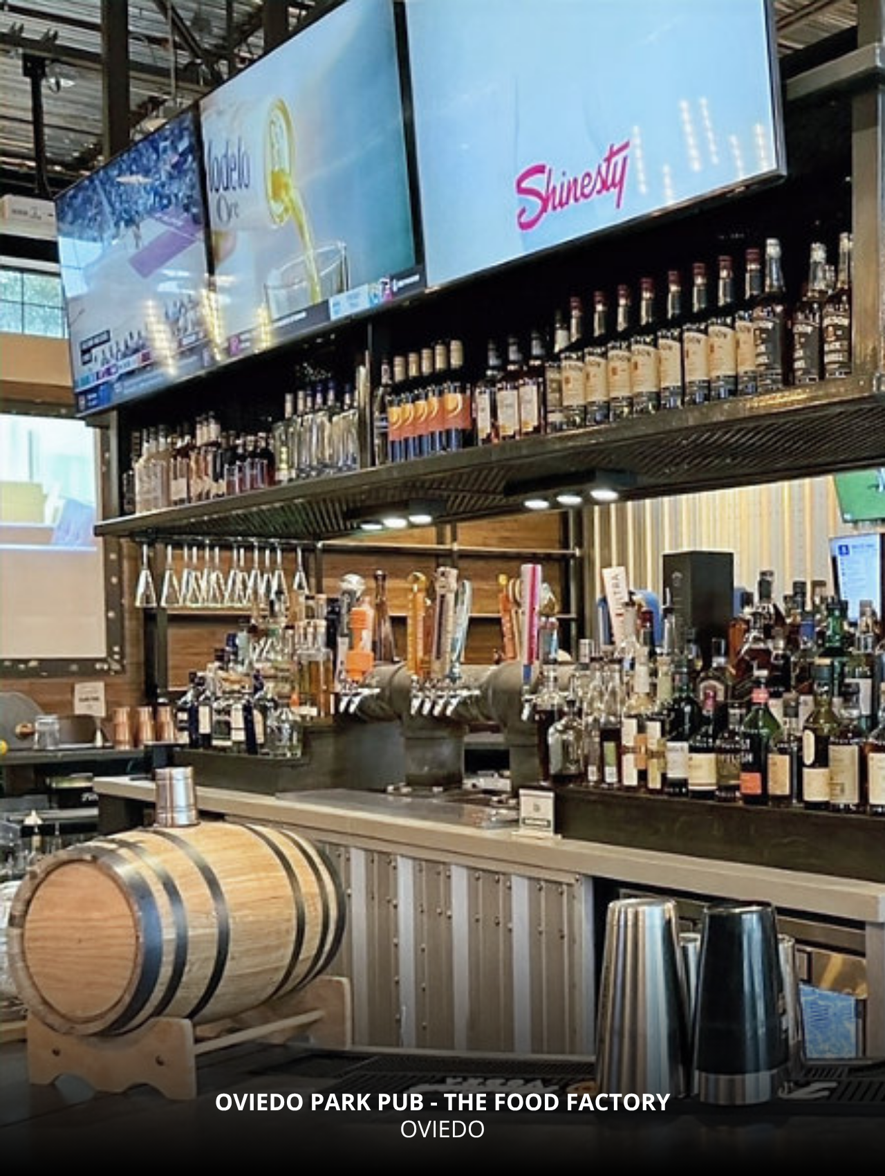 Bar setup and sports screens at Oviedo Park Pub in The Food Factory, Orlando Sports Bars