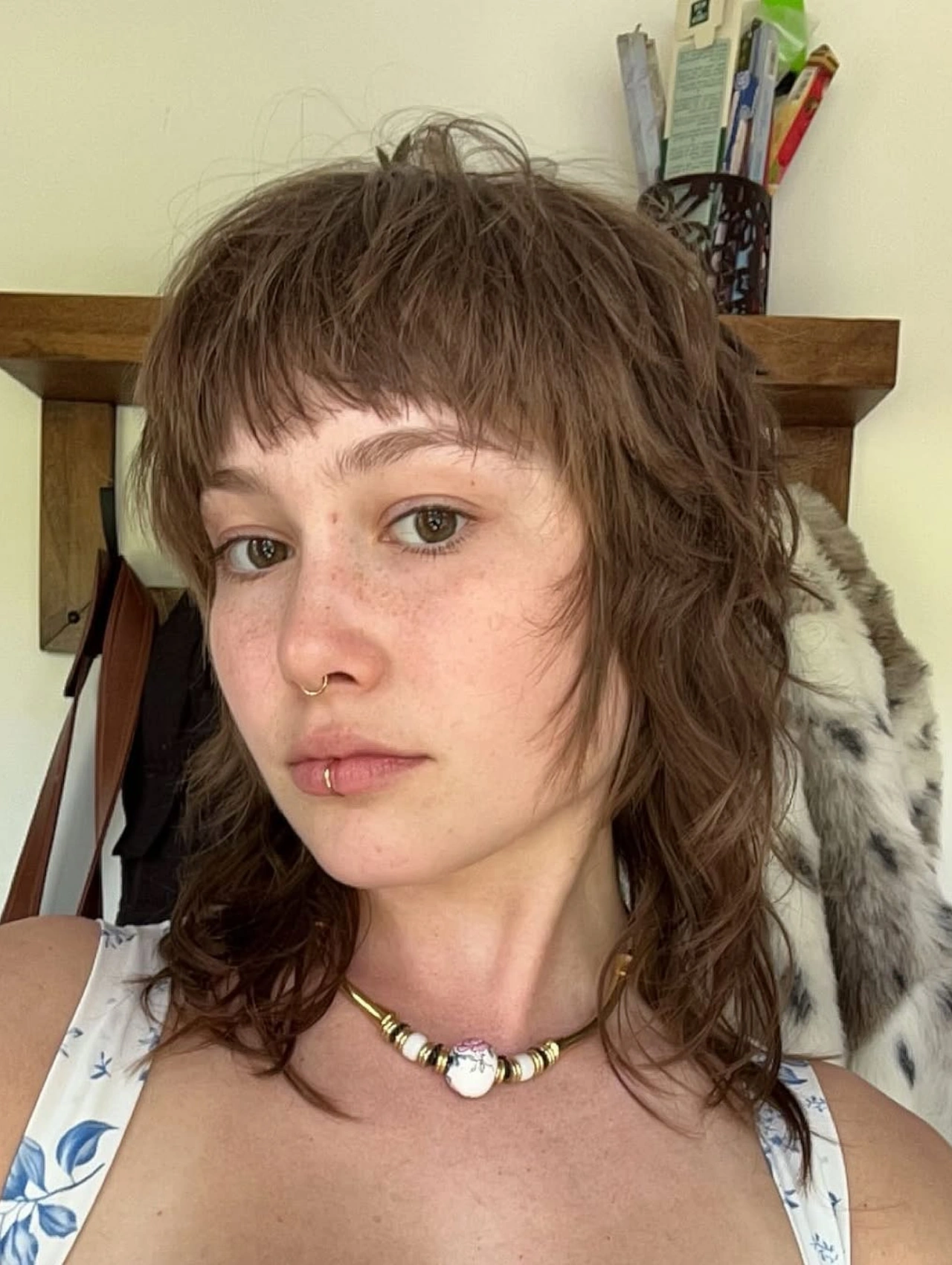 Shaggy mullet haircut with layered texture, Pixie-inspired modern mullet hairstyle.