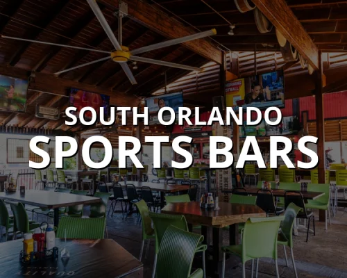 Covered patio with TVs and green chairs at one of the top sports bars in Orlando with big screens and open-air seating